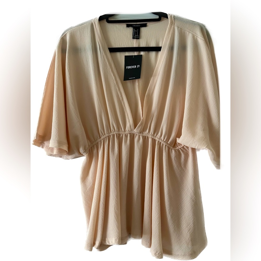 Light pink baby doll flowy top with drop neck